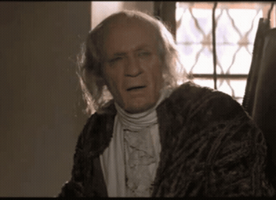 Man With Gray Hair In Brown Robe GIF