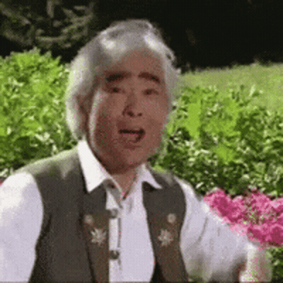 Man With Gray Hair Making Funny Face GIF