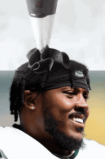 Man With Green Bay Packers Headband GIF
