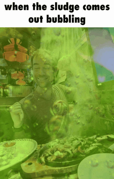 Man With Green Bubbles Coming Out Of Mouth When The Sludge Comes Out Bubbling GIF