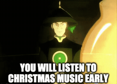 Man With Green Circle On Shirt Says You Will Listen To Christmas Music Early GIF