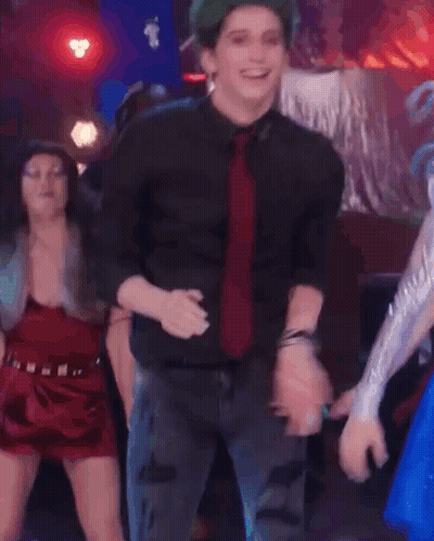 Man With Green Hair And Red Tie Dancing GIF