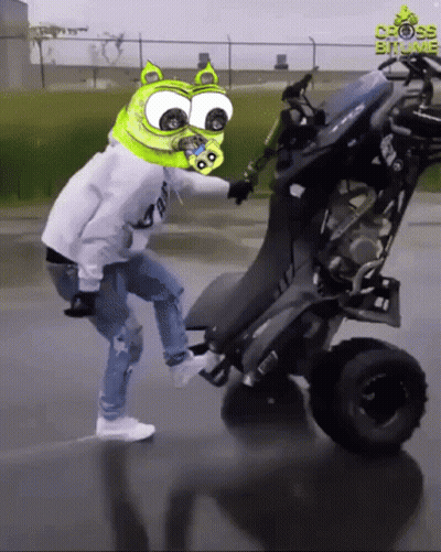 Man With Green Head Riding Four Wheeled Vehicle Cross Bit Me GIF
