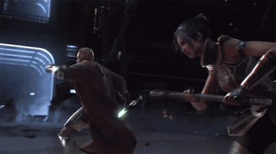 Man With Green Lightsaber And Woman With Sword GIF