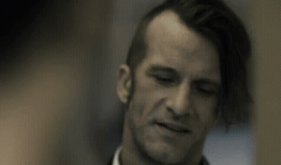 Man With Hand On Head Close Up GIF
