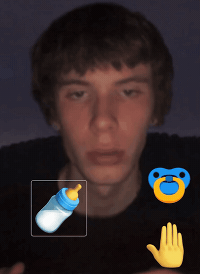 Man With Hand Tattoo Holding Pacifier GIF