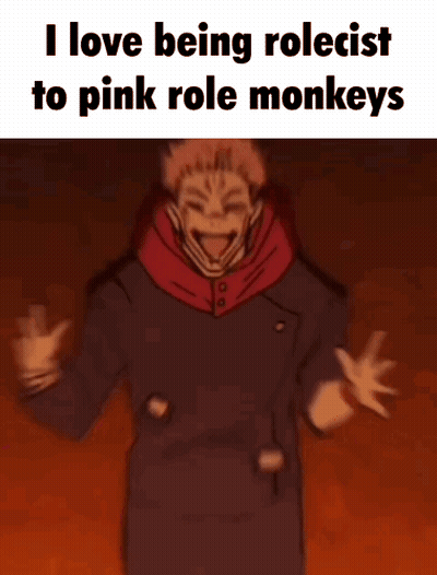 Man With Hands Folded Saying I Love Being Rolecist To Pink Role Monkeys GIF