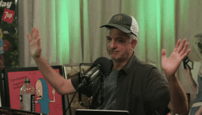 Man With Hands In Air In Front Of 7Up Sign GIF