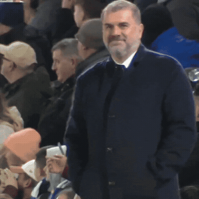 Man With Hands In Pockets In Crowd GIF