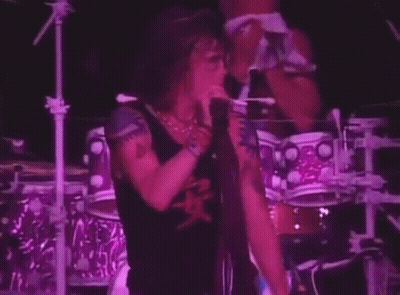 Man With Hands On Head At Microphone GIF