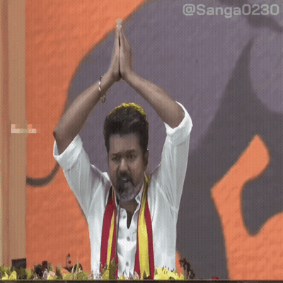 Man with Hands Up in Front of Screen @sanga0231