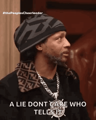 Man With Hat And Chain Says A Lie Dont Care Who Tells It GIF