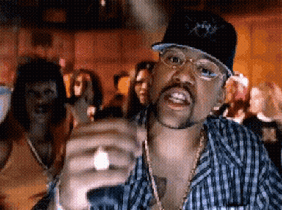 Man With Hat And Glasses In Front Of Group GIF