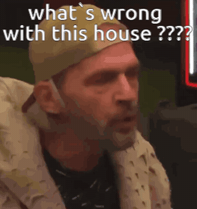 Man With Hat And Headphones Asking What's Wrong GIF