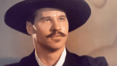 Man With Hat And Mustache Looking To Side GIF