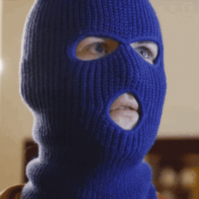 Man With Hat And Sunglasses Red Wall GIF