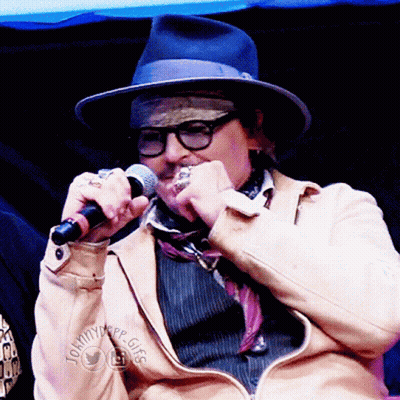 Man With Hat Glasses Holding Microphone Tommytype Gigg Jacket GIF