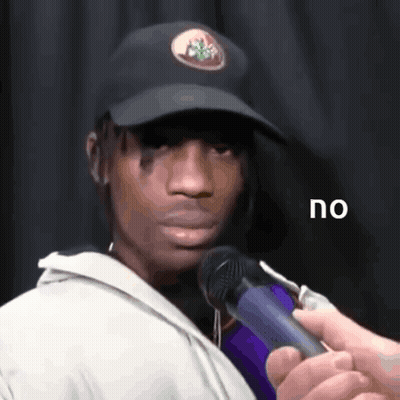 Man With Hat Holding Microphone Saying No GIF