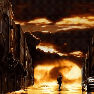 Man With Hat Letter A Standing In Front Of A Town Down GIF