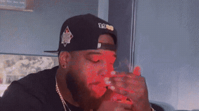 Man With Hat Saying 1000 GIF