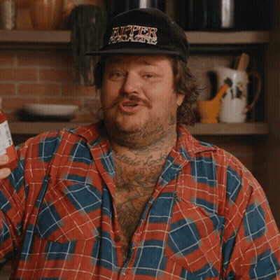 Man With Hat Saying Bitter Magazine GIF