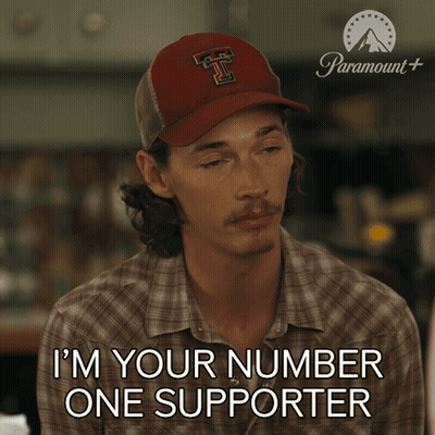 Man With Hat Saying 'T' As Number One Supporter GIF