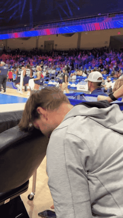 Man With Head On Chair At Basketball Game GIF