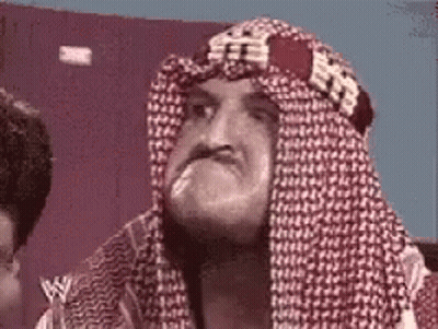 Man With Head Scarf Making Face GIF