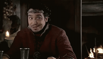 Man With Headband At Table With Two Cups GIF