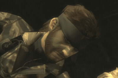 Man With Headband Kissing Woman In Video Game GIF