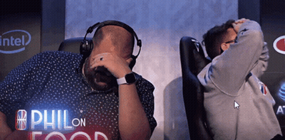 Man With Headphones And Another Man Beside Intel Logo GIF
