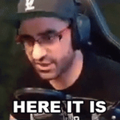 Man With Headphones And Baseball Cap Sitting GIF