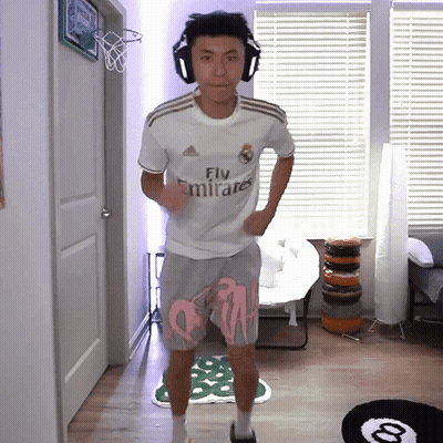 Man With Headphones And Fly Emirates Jersey GIF