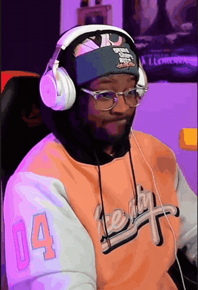 Man With Headphones And Glasses And Number 14 Shirt GIF