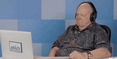 Man With Headphones And Glasses At Computer Monitor GIF