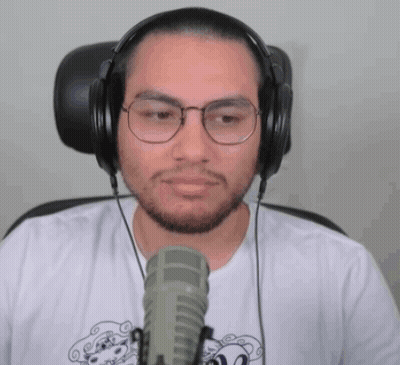 Man With Headphones And Glasses At Microphone GIF