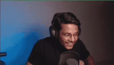Man With Headphones And Glasses Eating At Microphone GIF