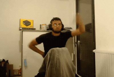 Man With Headphones And Glasses In Front Of Xbox 360 Box GIF