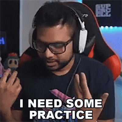 Man With Headphones And Glasses In Gaming Chair Saying I Need Some Practice GIF