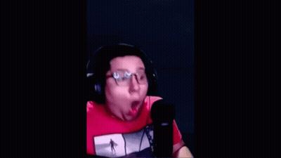 Man With Headphones And Glasses Making Funny Face At Microphone GIF