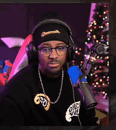 Man With Headphones And Glasses Pointing GIF