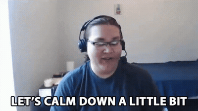 Man With Headphones And Glasses Saying Let's Calm Down A Little Bit GIF