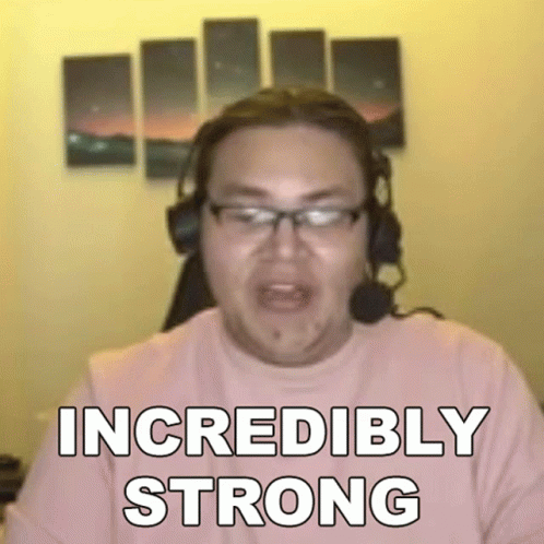 Man With Headphones And Glasses Says Incredibly Strong At Computer GIF