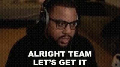 Man With Headphones And Glasses Sitting At Table GIF
