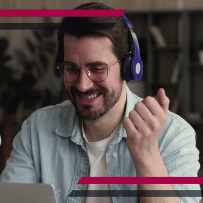 Man With Headphones And Glasses Smiling At Laptop GIF