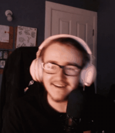 Man With Headphones And Glasses Smiling GIF