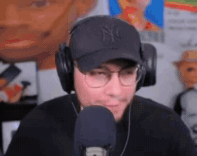 Man With Headphones And Hat At Microphone GIF