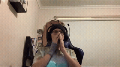 Man With Headphones And Hat Hands On Face GIF