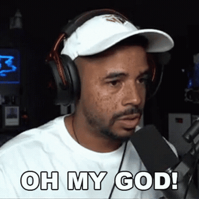 Man With Headphones and Hat Saying Oh My God