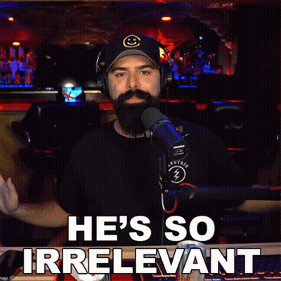 Man With Headphones And Hat Says Irrelevant GIF